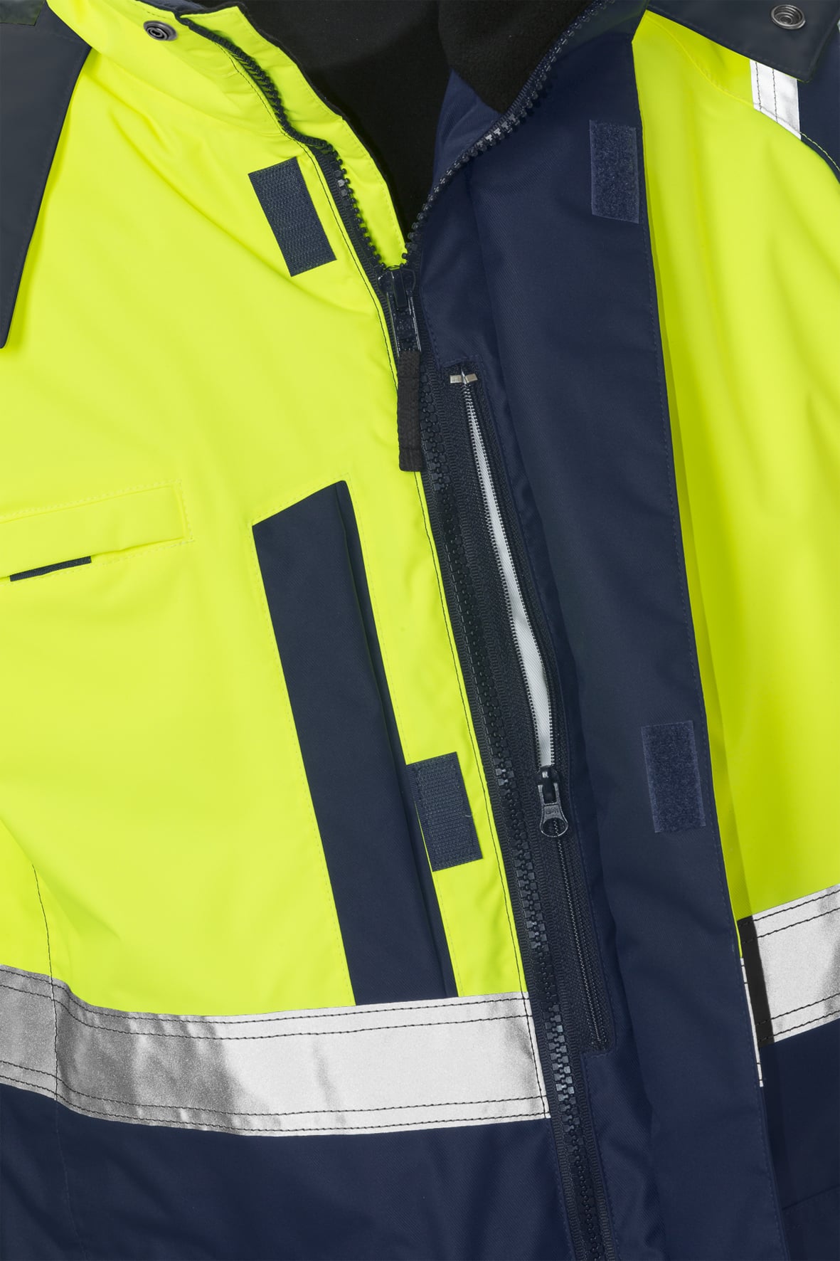 High Vis Airtech® 3-in-1 Parka Kl. 3 4036 GTT High Vis Airtech® 3-in-1 Parka Kl. 3 4036 GTT von Fristads, Detail Frontverschluss und Brusttaschen