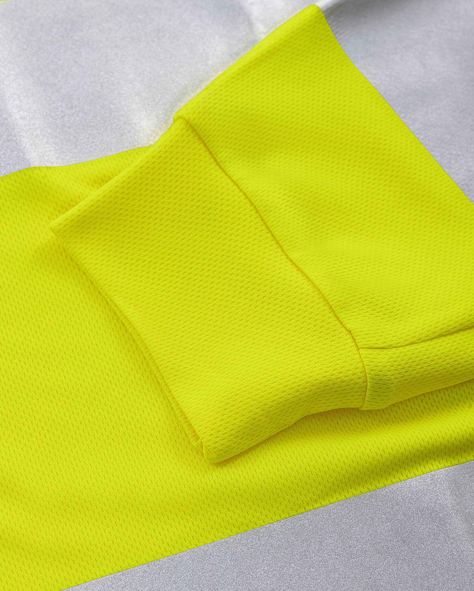 High Vis Green Funktions-Poloshirt Langarm Kl. 3 7864 GPST High Vis Green Funktions-Poloshirt Langarm Kl. 3 7864 GPST von Fristads, Detail Ärmelbündchen aus doppelt gelegtem Material