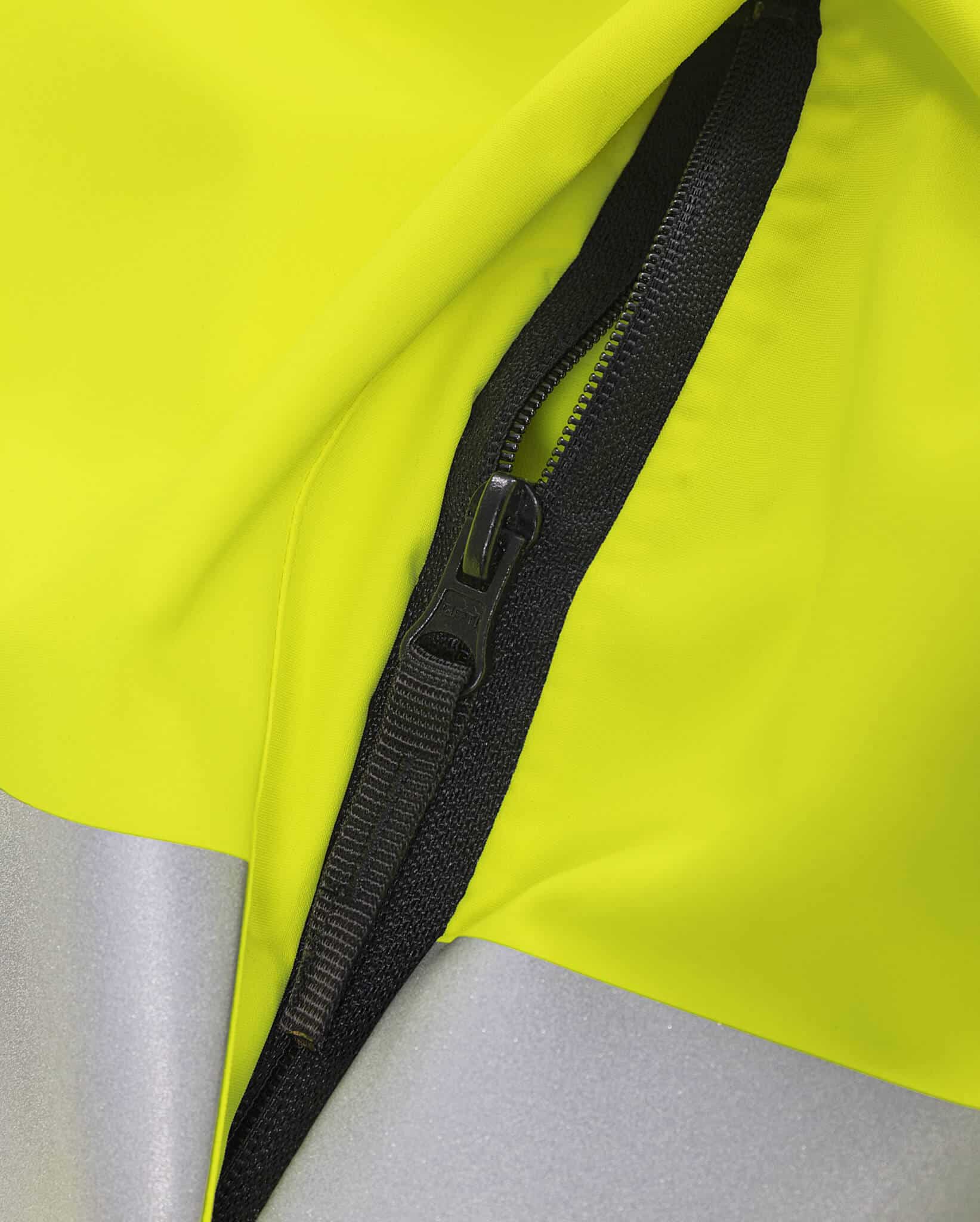 High Vis Green Funktionsjacke Kl. 3 4680 GLPS High Vis Green Funktionsjacke Kl. 3 4680 GLPS von Fristads, Detail Vordertasche mit Reißverschluss