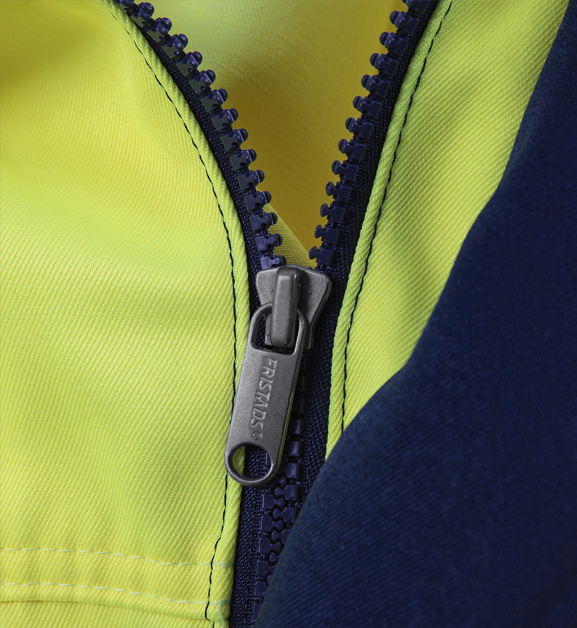High Vis Jacke Kl. 3 4797 TH High Vis Jacke Kl. 3 4797 TH von Fristads, Detail verdeckter Reißverschluss