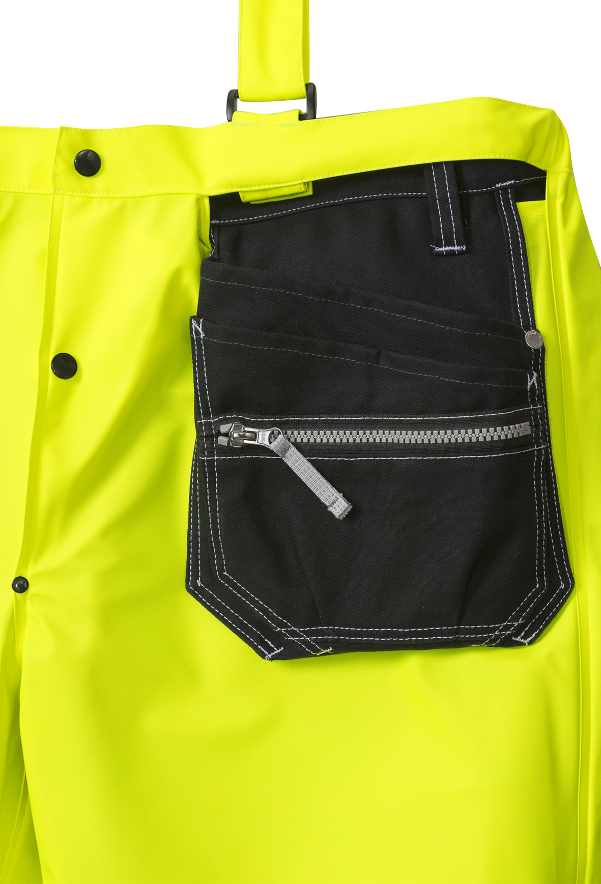 High Vis Regenhose Kl. 2 2625 RS High Vis Regenhose Kl. 2 2625 RS von Fristads, Detail Öffnung für die Hängetasche der Arbeitshose
