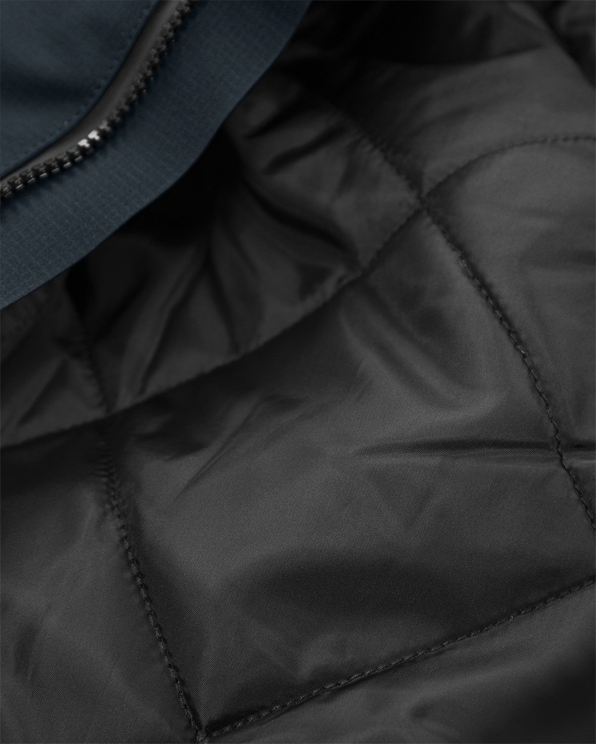 Stretch-Winterjacke Damen 4884 GLS Stretch-Winterjacke Damen 4884 GLS von Fristads, Detail gestepptes Futter mit Innentasche